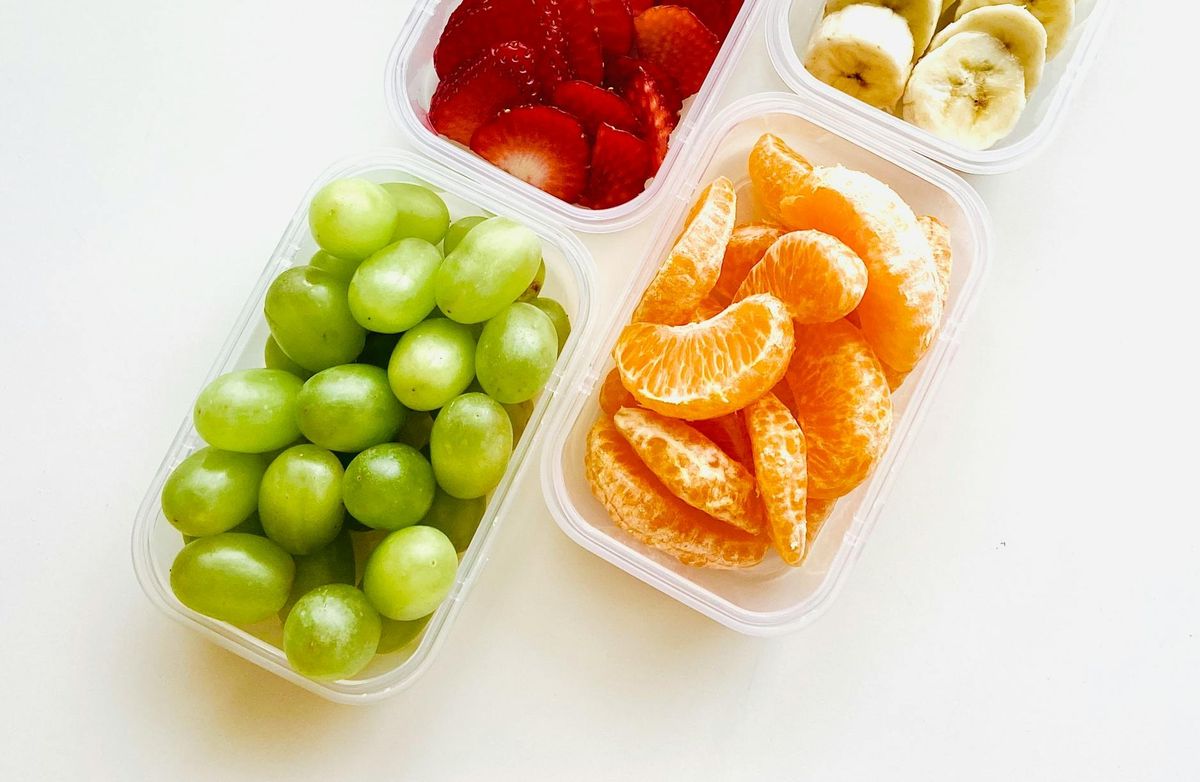 Bright and fresh fruits in containers.